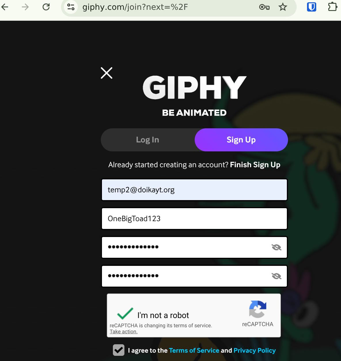 Signing up for a new account on Giphy, with email, username, and a generated password entered